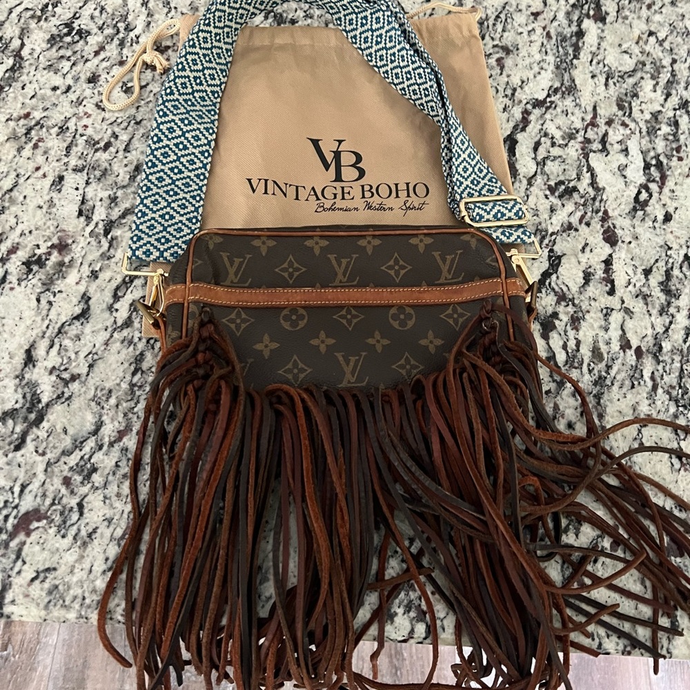 LV fringe purse